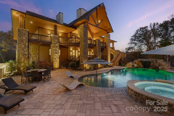 a view of pool with outdoor seating