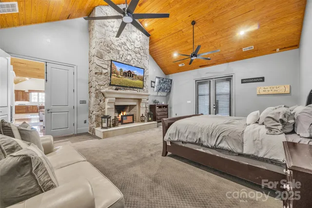 a bed room with a bed and a fireplace