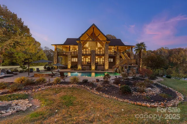 a view of a large trees in front of a house