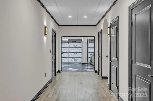 an empty room with closet and wooden floor