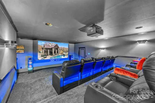 a living room with furniture and pool table