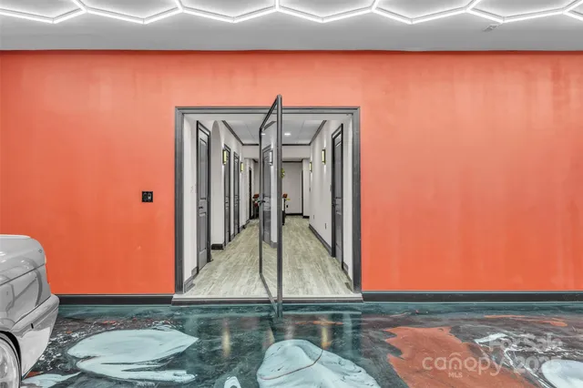 a balcony with table and chairs