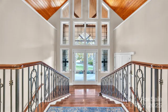 a view of staircase with large windows