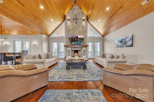 a living room with furniture fireplace and window