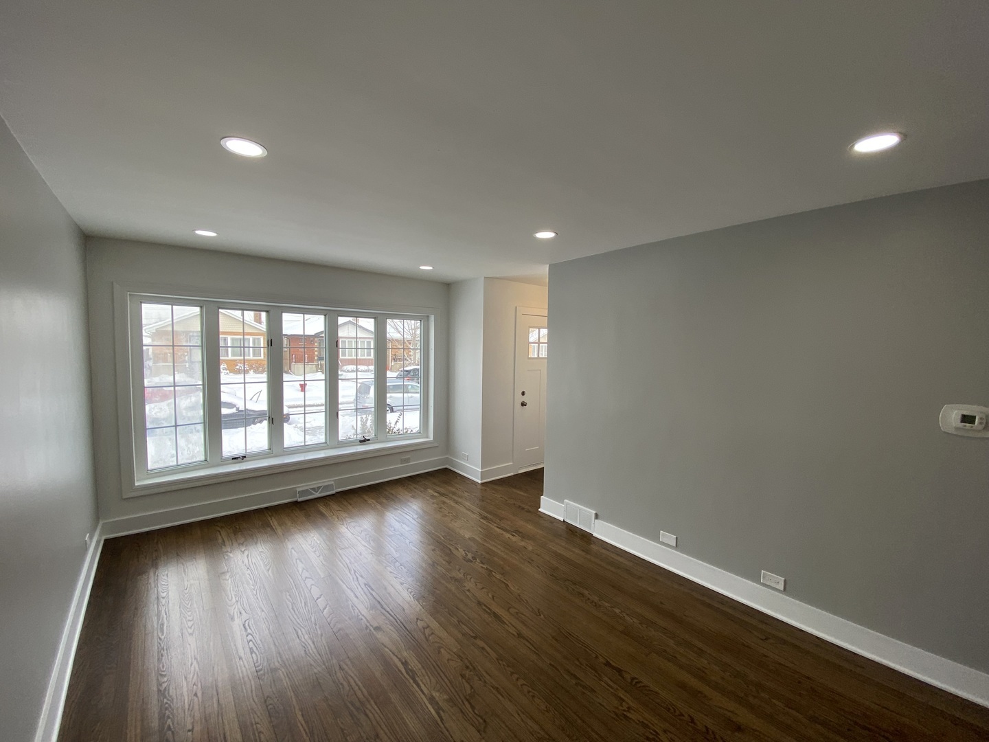 6531 West 64th Street Chicago, IL 60638 - Photo 13 of 19 an empty room with wooden floor and windows