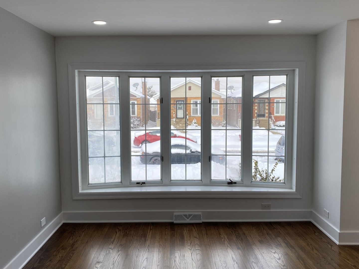 6531 West 64th Street Chicago, IL 60638 - Photo 14 of 19 a view of empty room with wooden floor and fan
