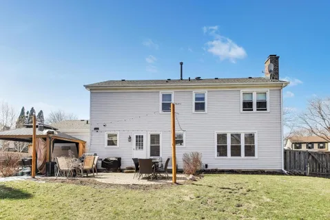 a front view of building with yard