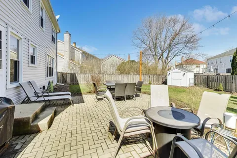 a view of a patio with couches table and chairs