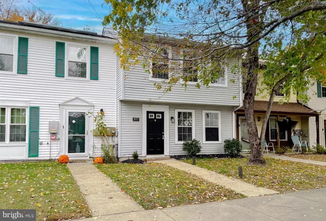 front view of a house with a patio
