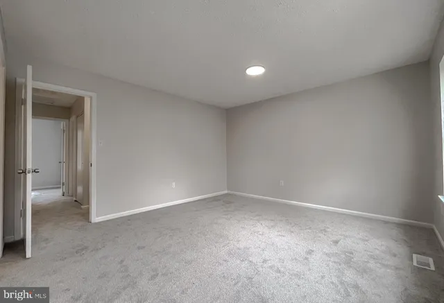 an empty room with a natural light