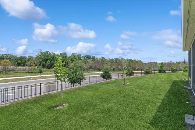 a view of a garden and lake