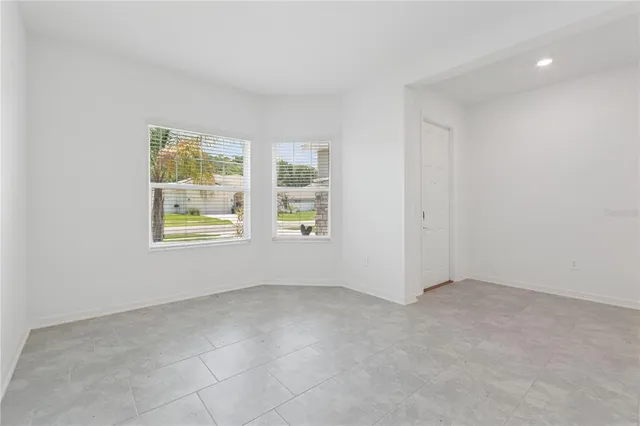 an empty room with windows