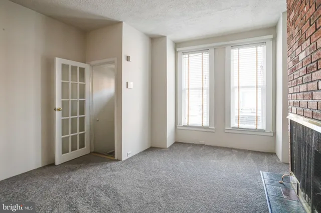 a view of a hallway with staircase