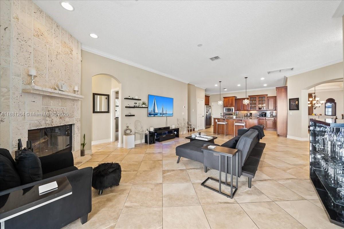 6340 Highway 1 Cocoa, FL 32927 - Photo 24 of 54 a living room with furniture and a fireplace
