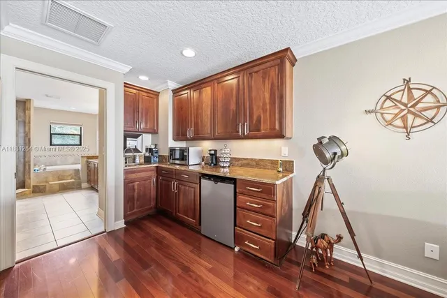 a view of balcony with wooden floor