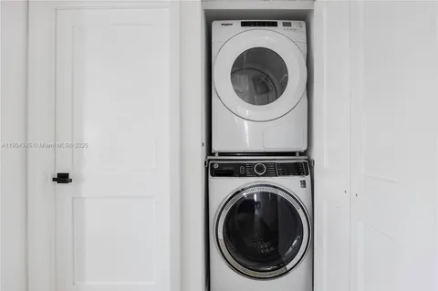 a close up view of a washer and dryer in a utility room