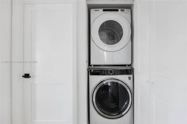 a close up view of a washer and dryer in a utility room
