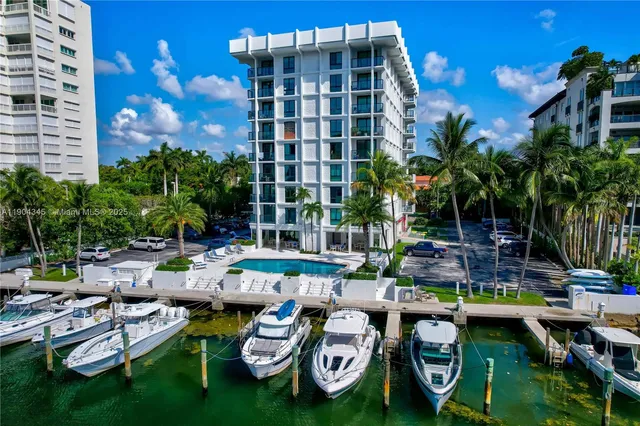 a row of pool table and chairs in patio