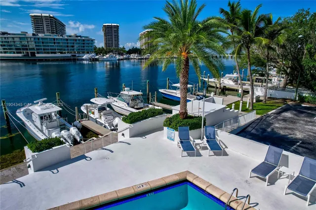 a view of a house with outdoor seating space