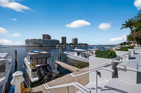 a view of a chairs and table in a terrace