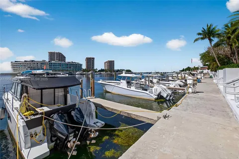 a view of a chairs and table in a patio