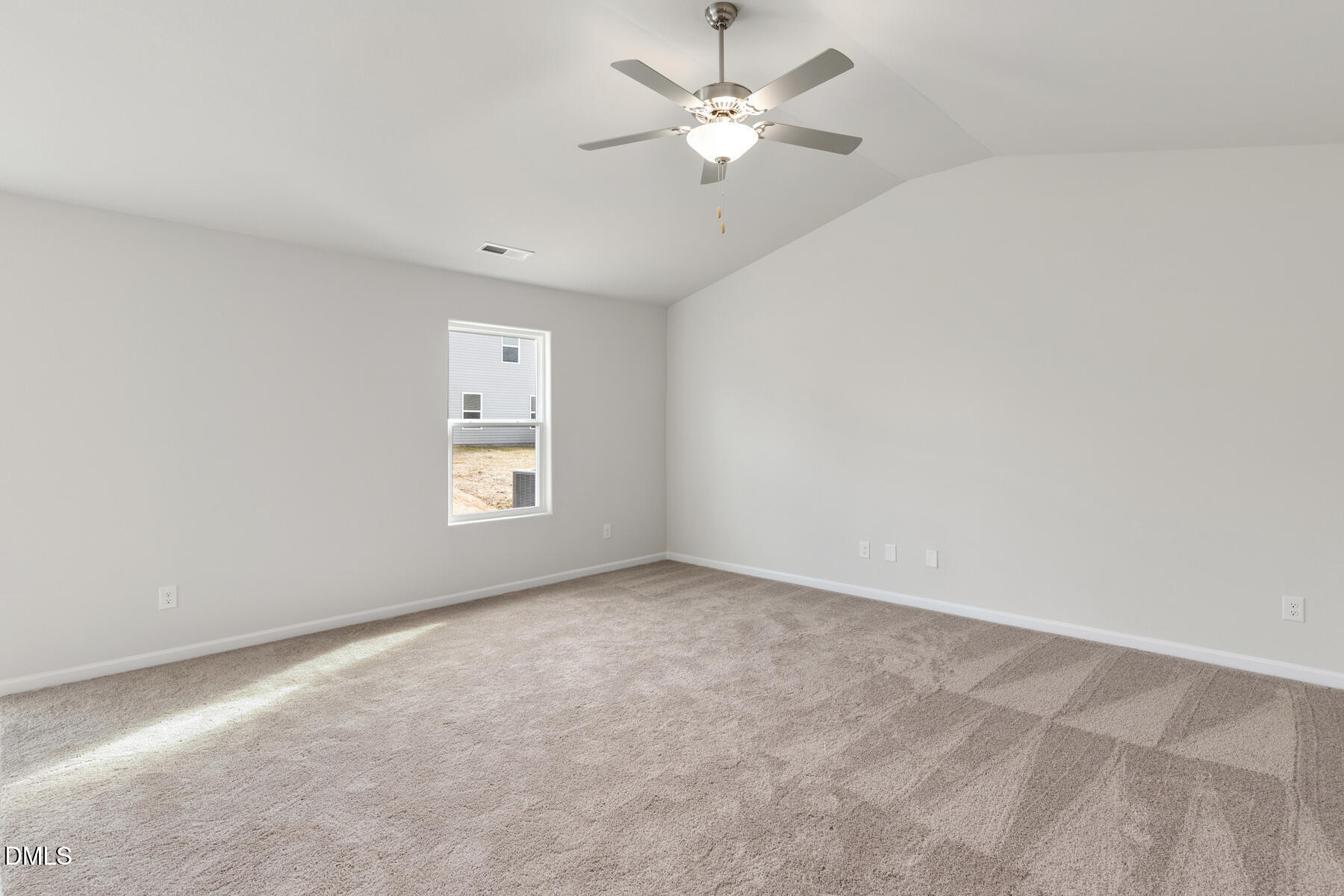 12 Crow Field Street Roxboro, NC 27574 - Photo 3 of 18 an empty room with windows and fan