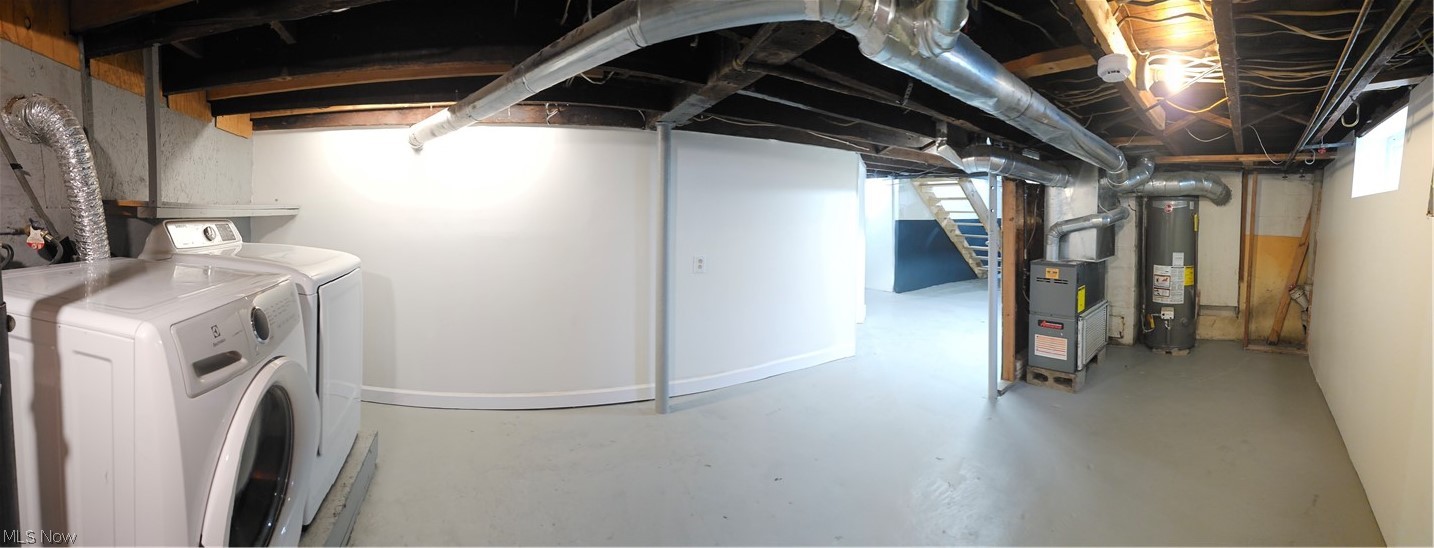 753 West River Road North Elyria, OH 44035 - Photo 16 of 28 Basement space featuring painted concrete flooring, white walls, and exposed ceiling joists