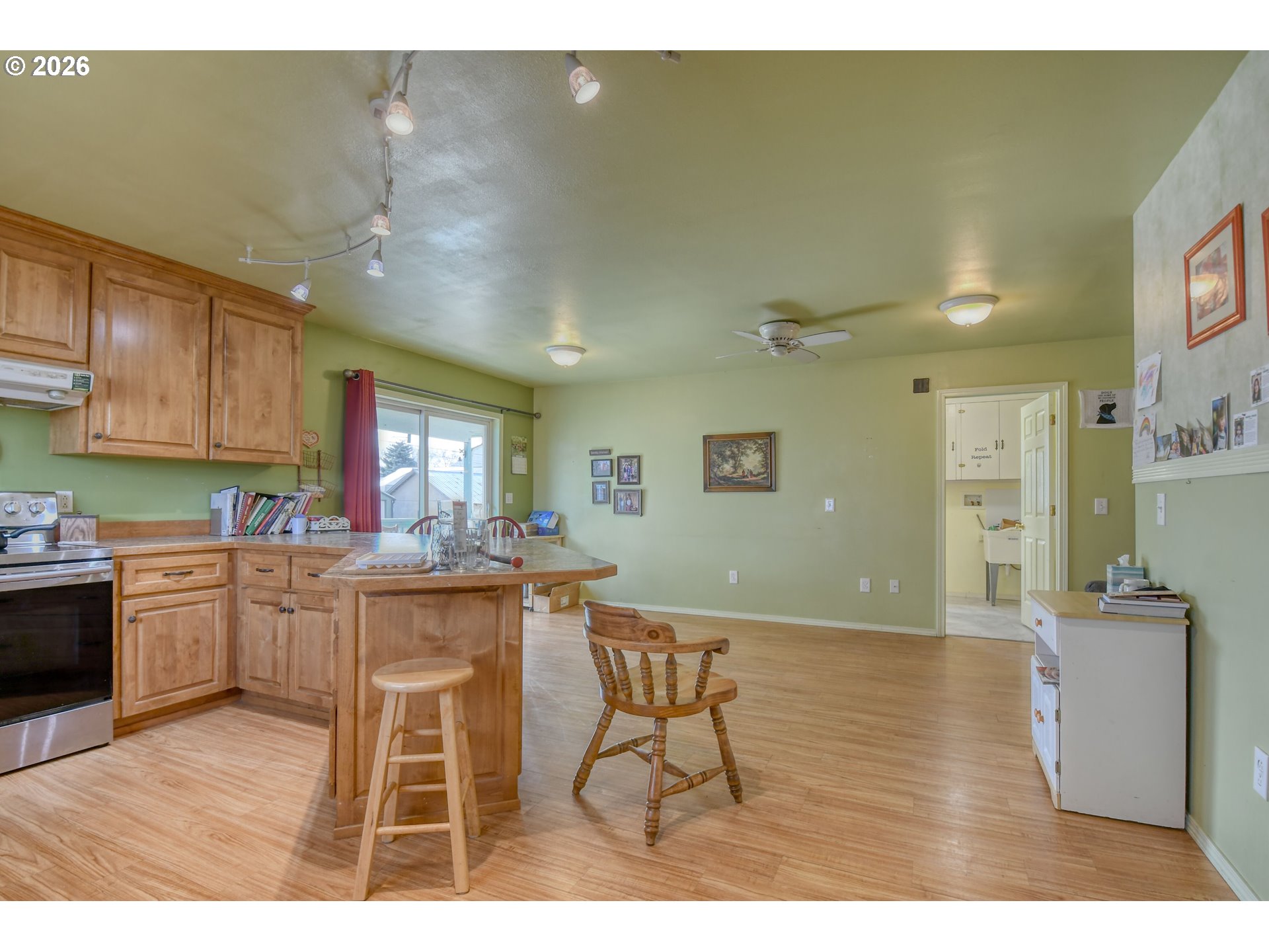 554 West High Street Athena, OR 97813 - Photo 14 of 46 a kitchen with stainless steel appliances granite countertop a sink and cabinets