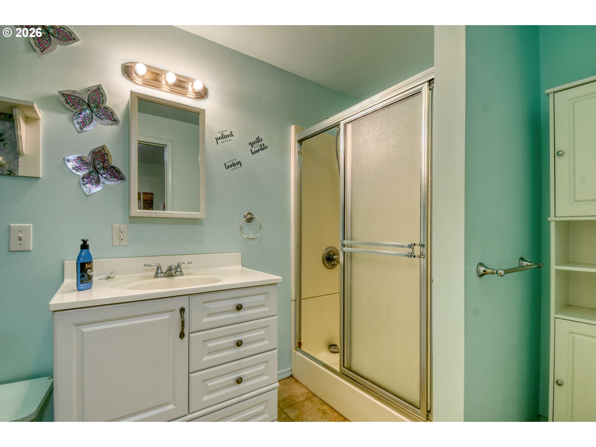 554 West High Street Athena, OR 97813 - Photo 26 of 46 a bathroom with a sink mirror and a shower