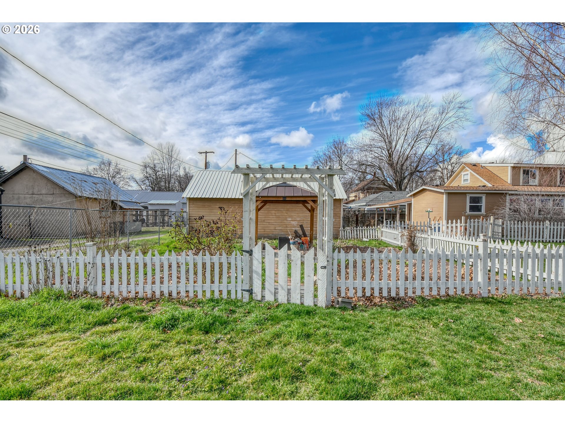 554 West High Street Athena, OR 97813 - Photo 31 of 46 a view of a house with wooden fence