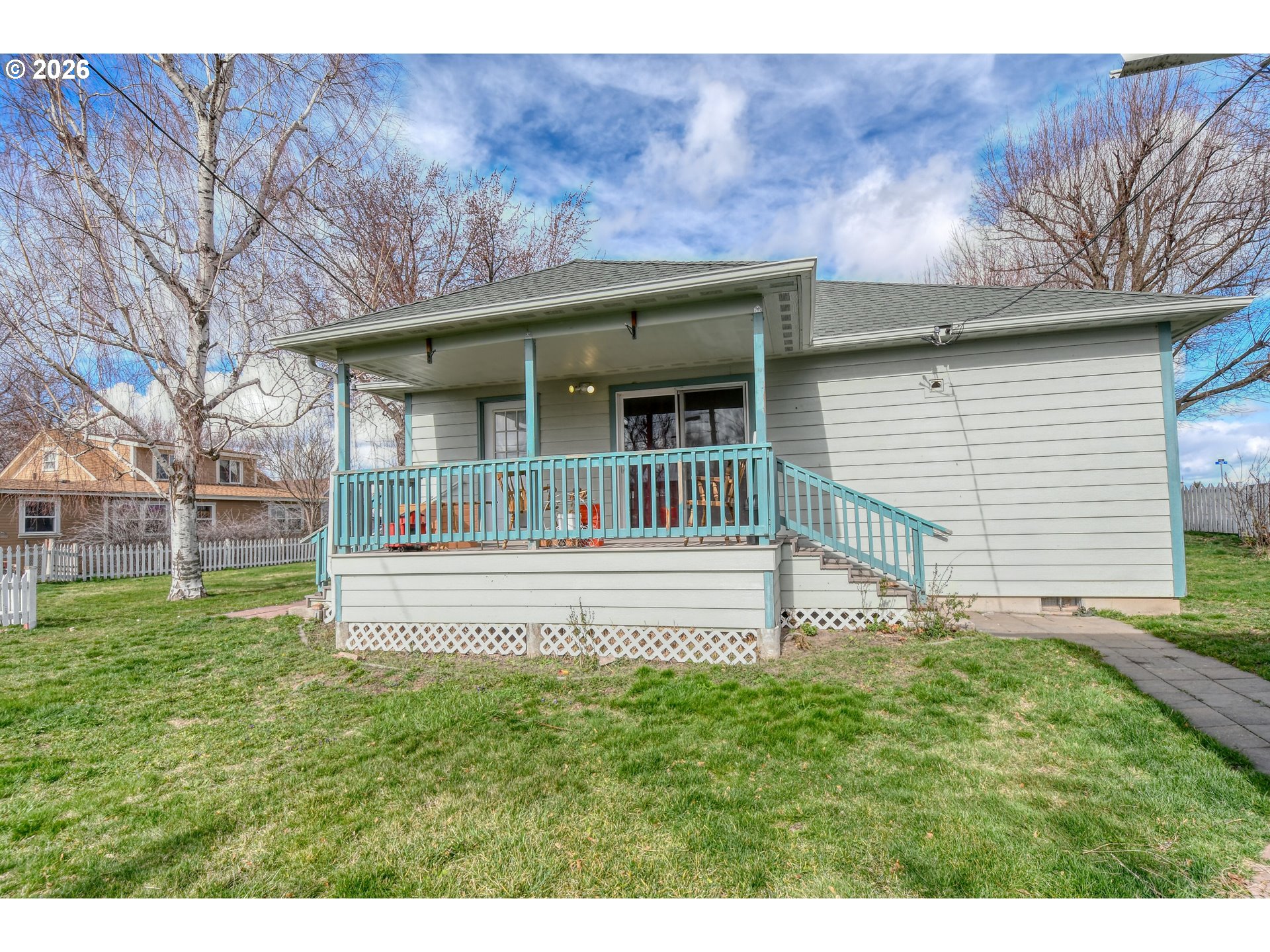 554 West High Street Athena, OR 97813 - Photo 35 of 46 a view of a house with a yard and a garden