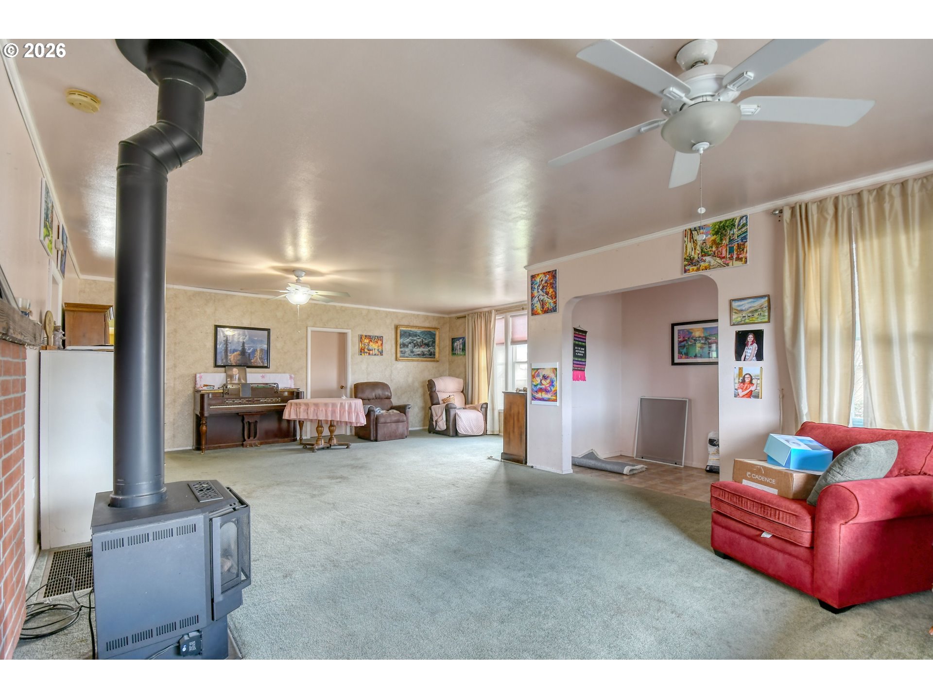 554 West High Street Athena, OR 97813 - Photo 4 of 46 a living room with furniture and a chandelier