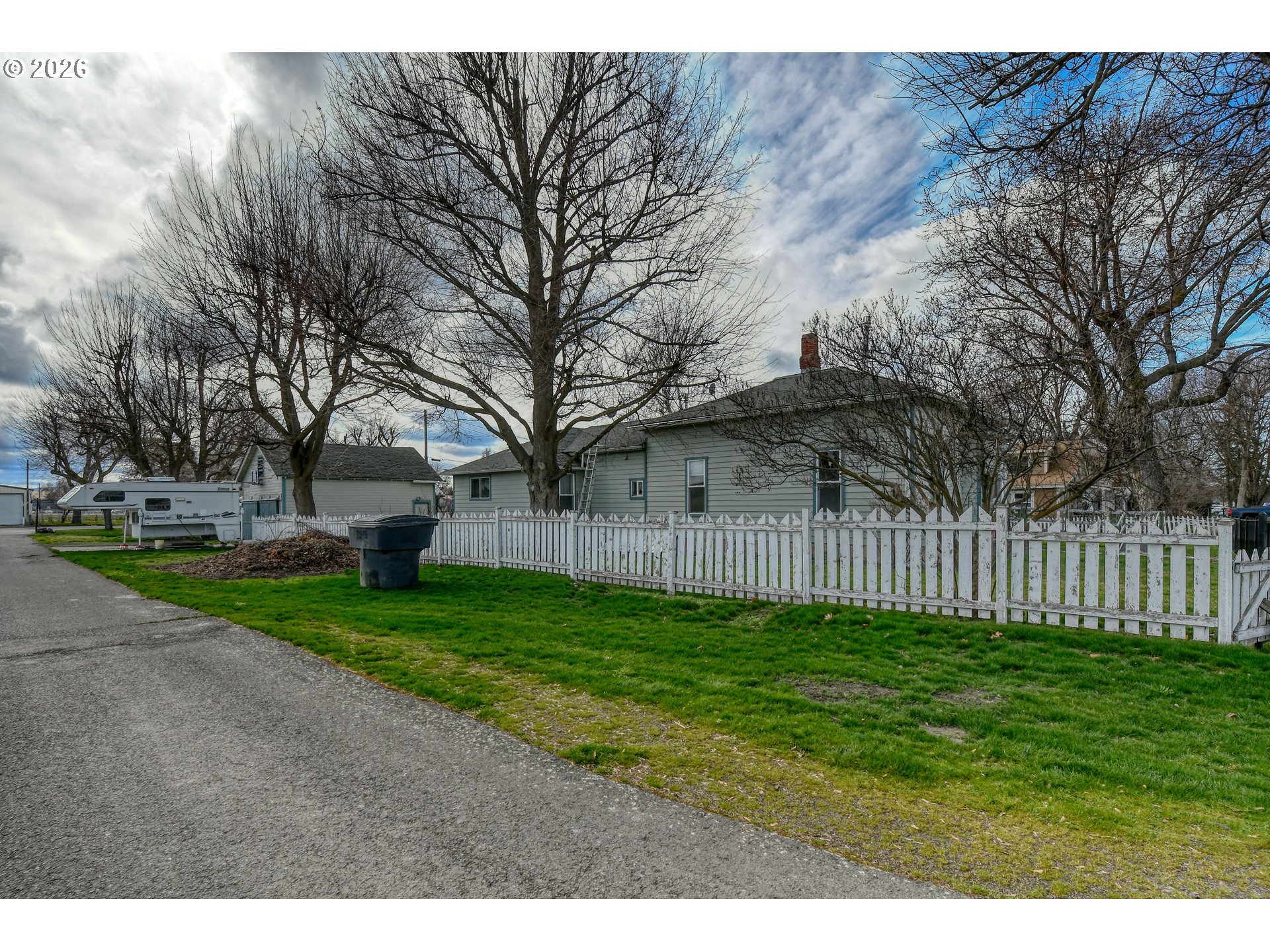554 West High Street Athena, OR 97813 - Photo 42 of 46 a view of a yard with wooden fence