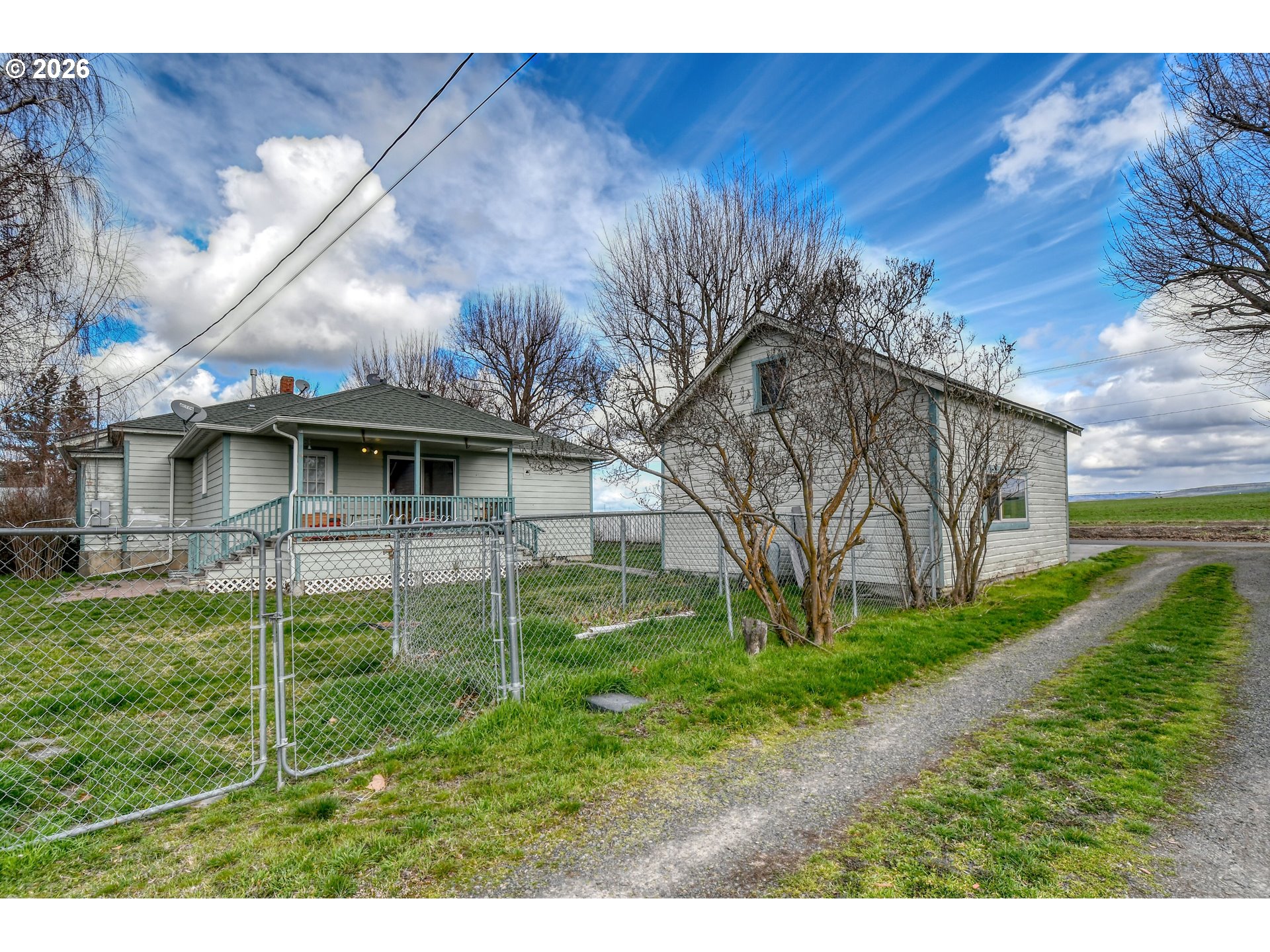 554 West High Street Athena, OR 97813 - Photo 43 of 46 a view of a wooden house with a yard