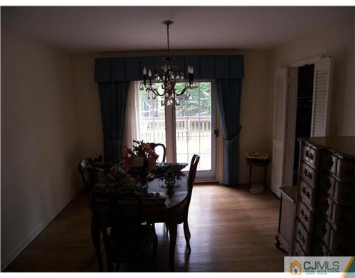 5 Huntington Road Edison, NJ 08820 - Photo 3 of 7 a view of a dining room with furniture window and wooden floor