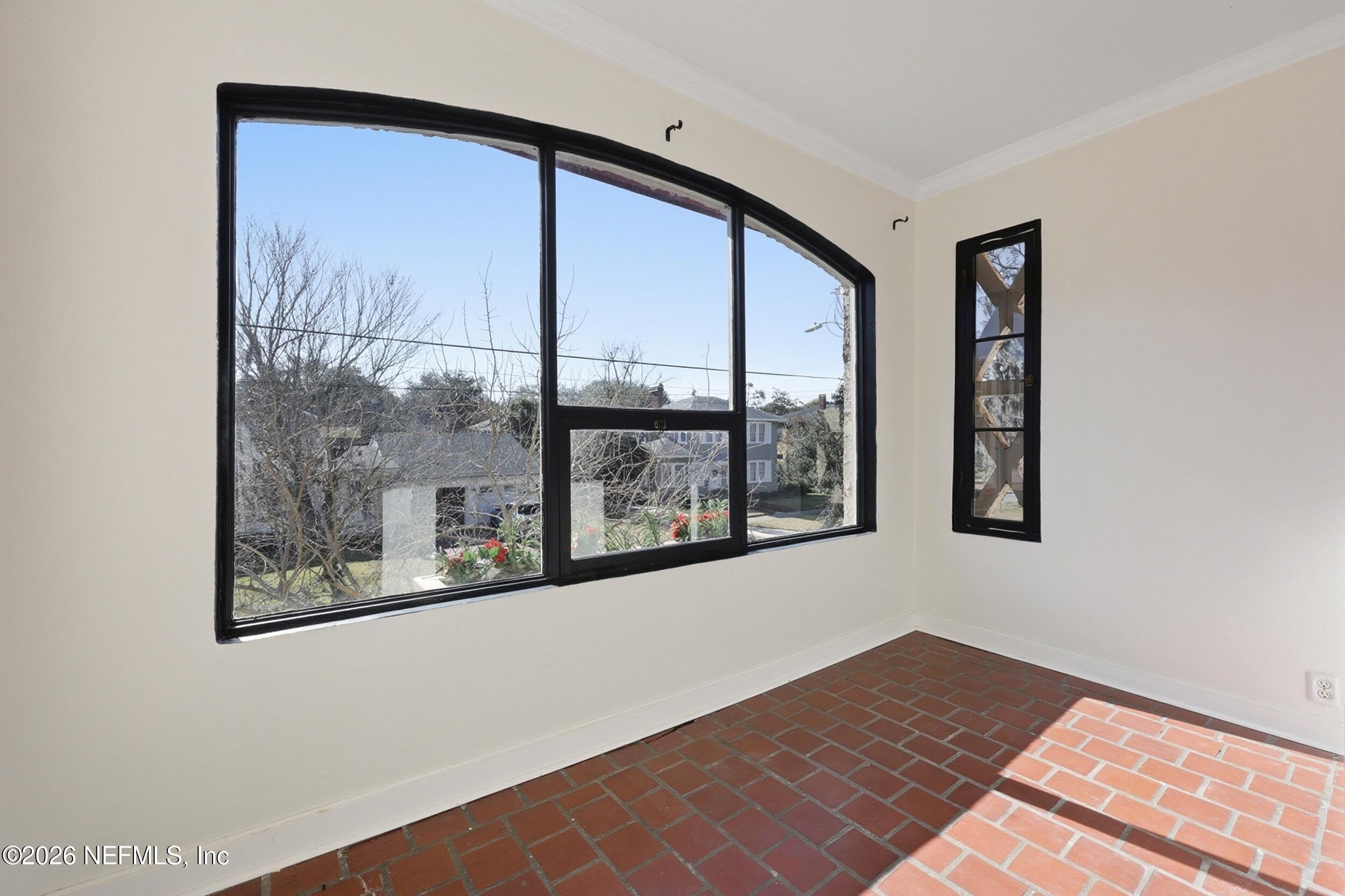1625 Seminole Road, Unit 1625 Jacksonville, FL 32205 - Photo 9 of 22 a view of an empty room with a window
