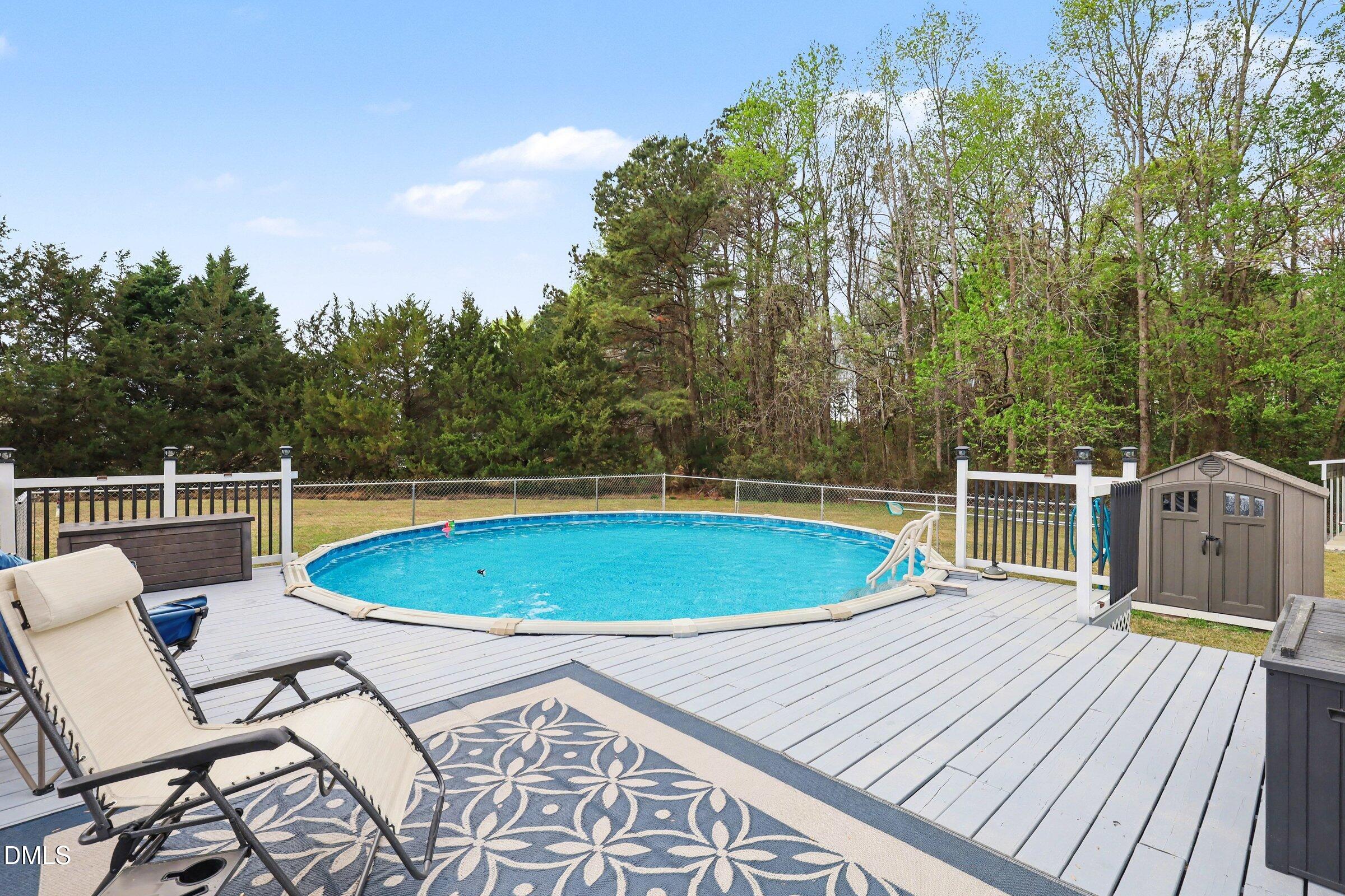 430 Fred Hall Road Stedman, NC 28391 - Photo 41 of 63 a view of a swimming pool with a patio