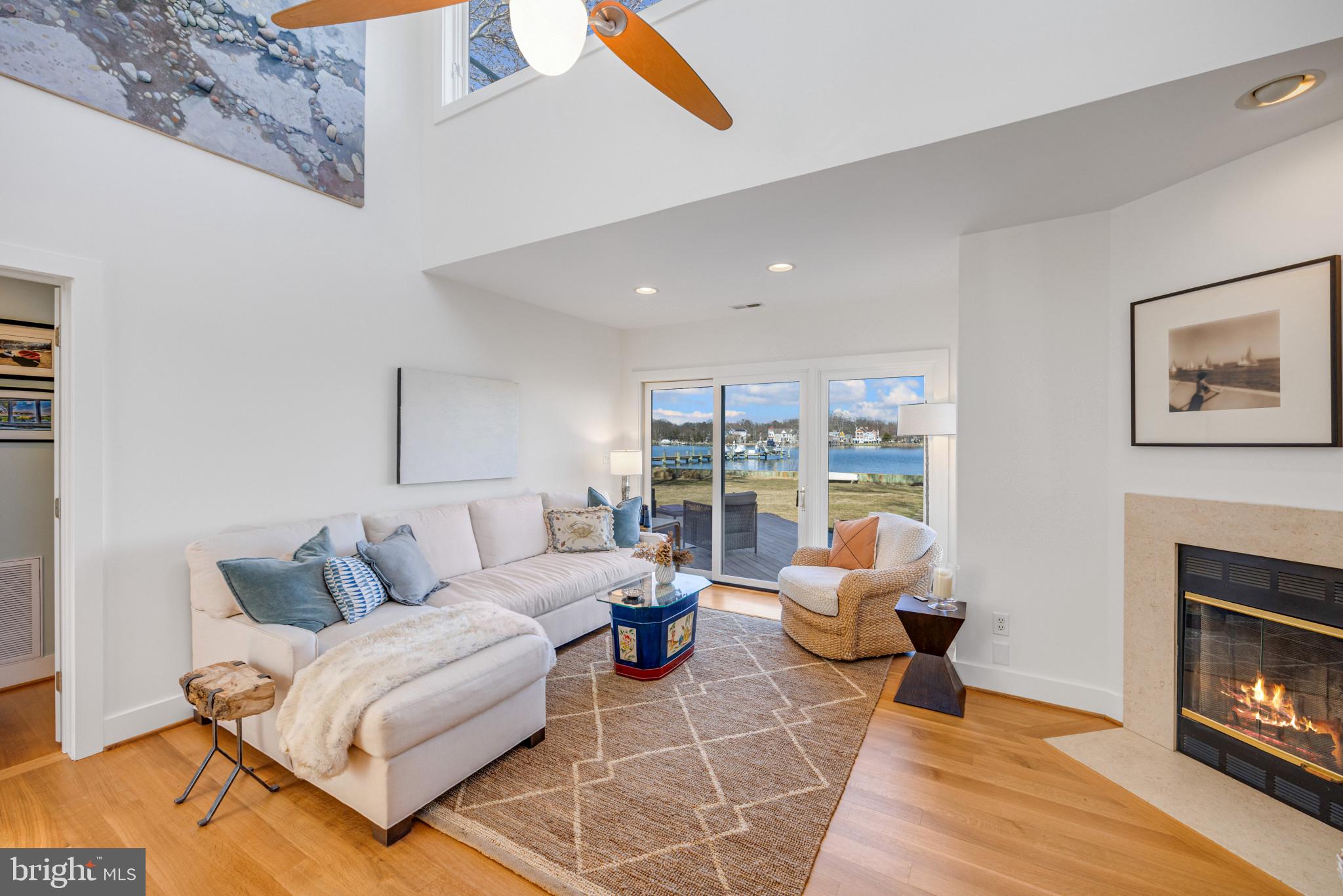 3803 Thomas Point Road Annapolis, MD 21403 - Photo 9 of 42 Living Room with cozy fireplace & soaring ceiling