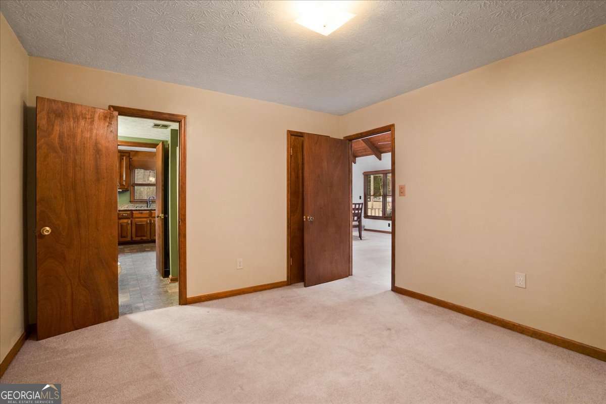 59 Busbin Lane Colbert, GA 30628 - Photo 13 of 29 a view of an empty room