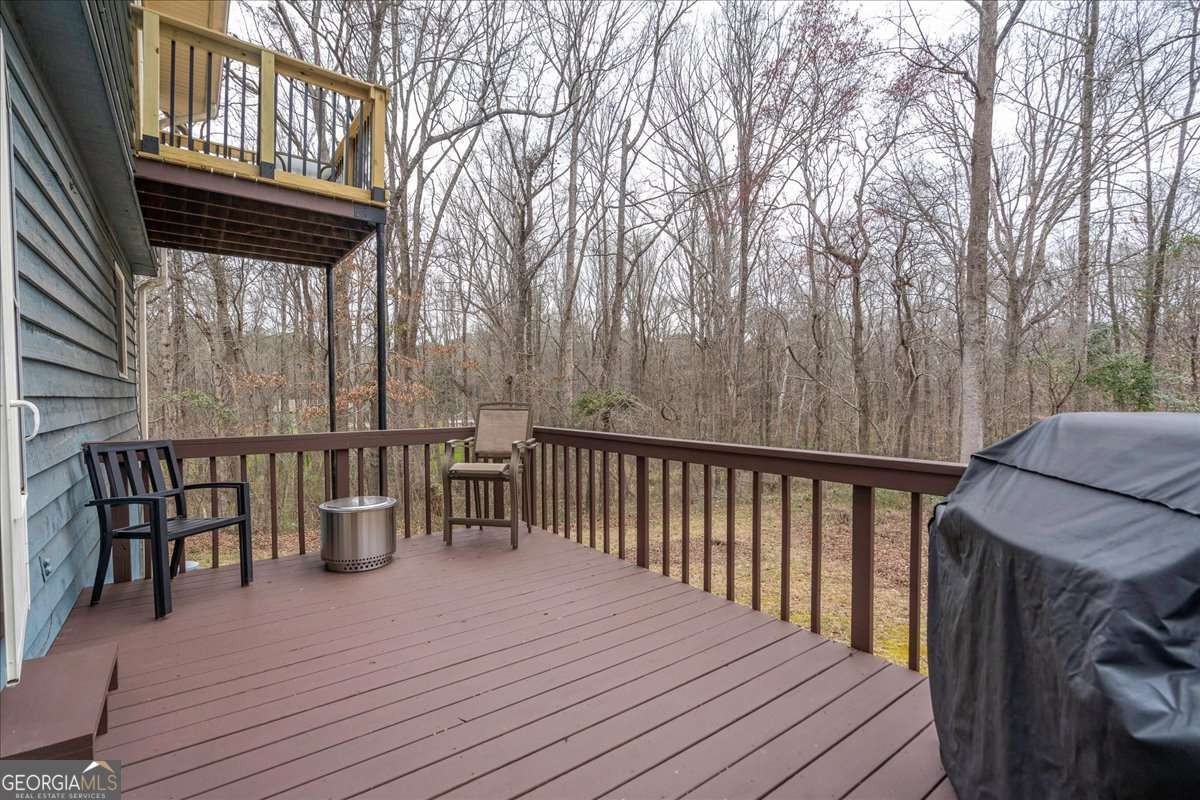 59 Busbin Lane Colbert, GA 30628 - Photo 24 of 29 a view of a two chairs on the roof deck