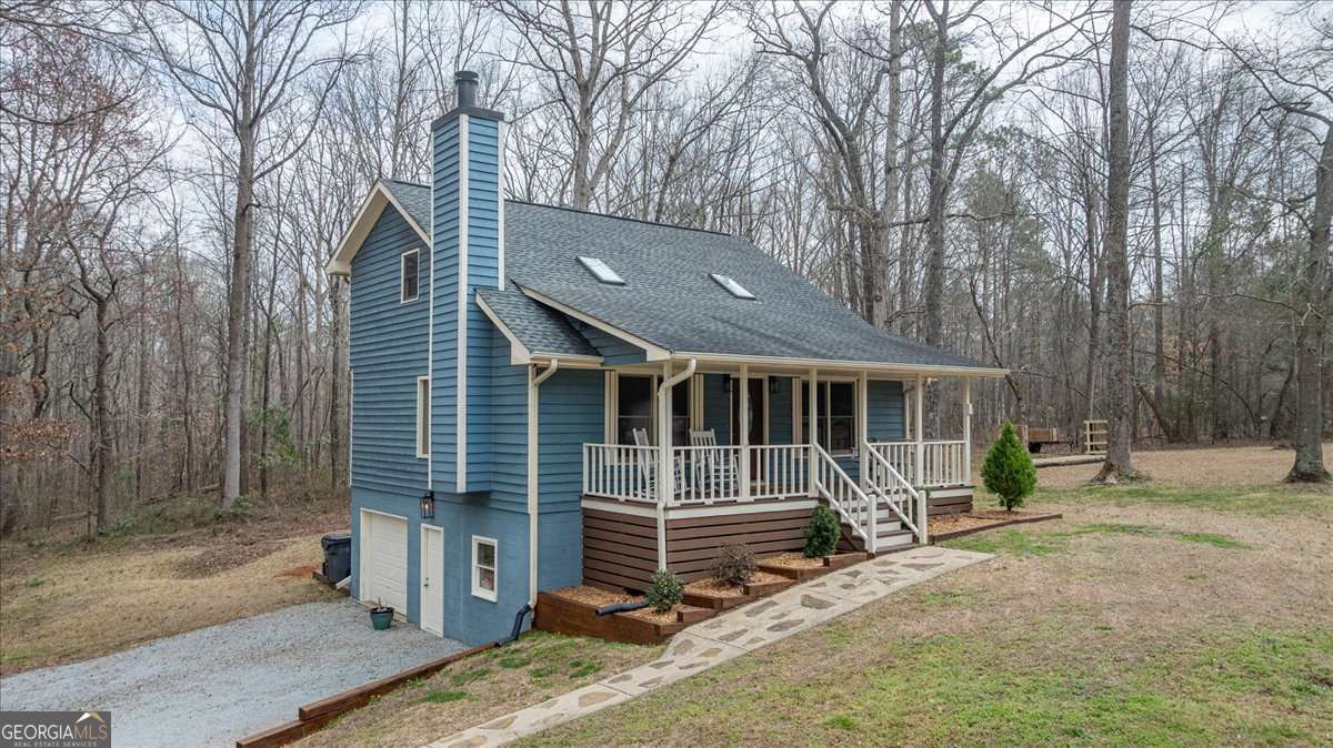 59 Busbin Lane Colbert, GA 30628 - Photo 3 of 29 a view of house with a outdoor space