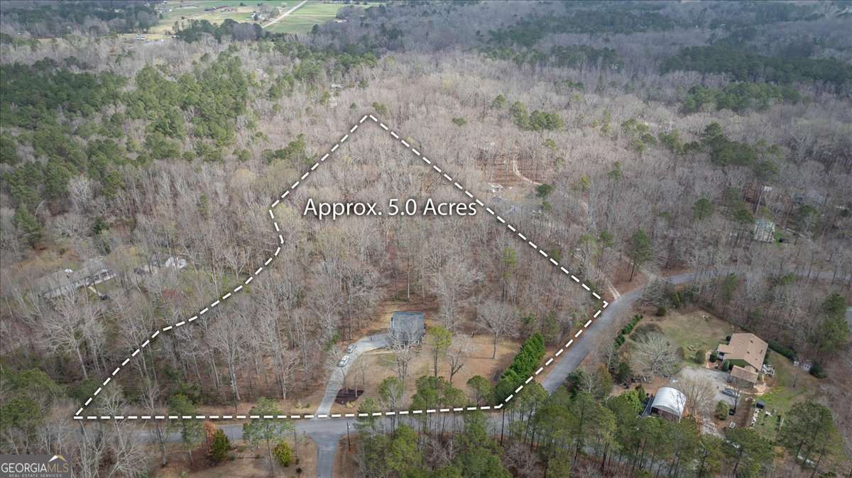 59 Busbin Lane Colbert, GA 30628 - Photo 7 of 29 a aerial view of a house with a yard