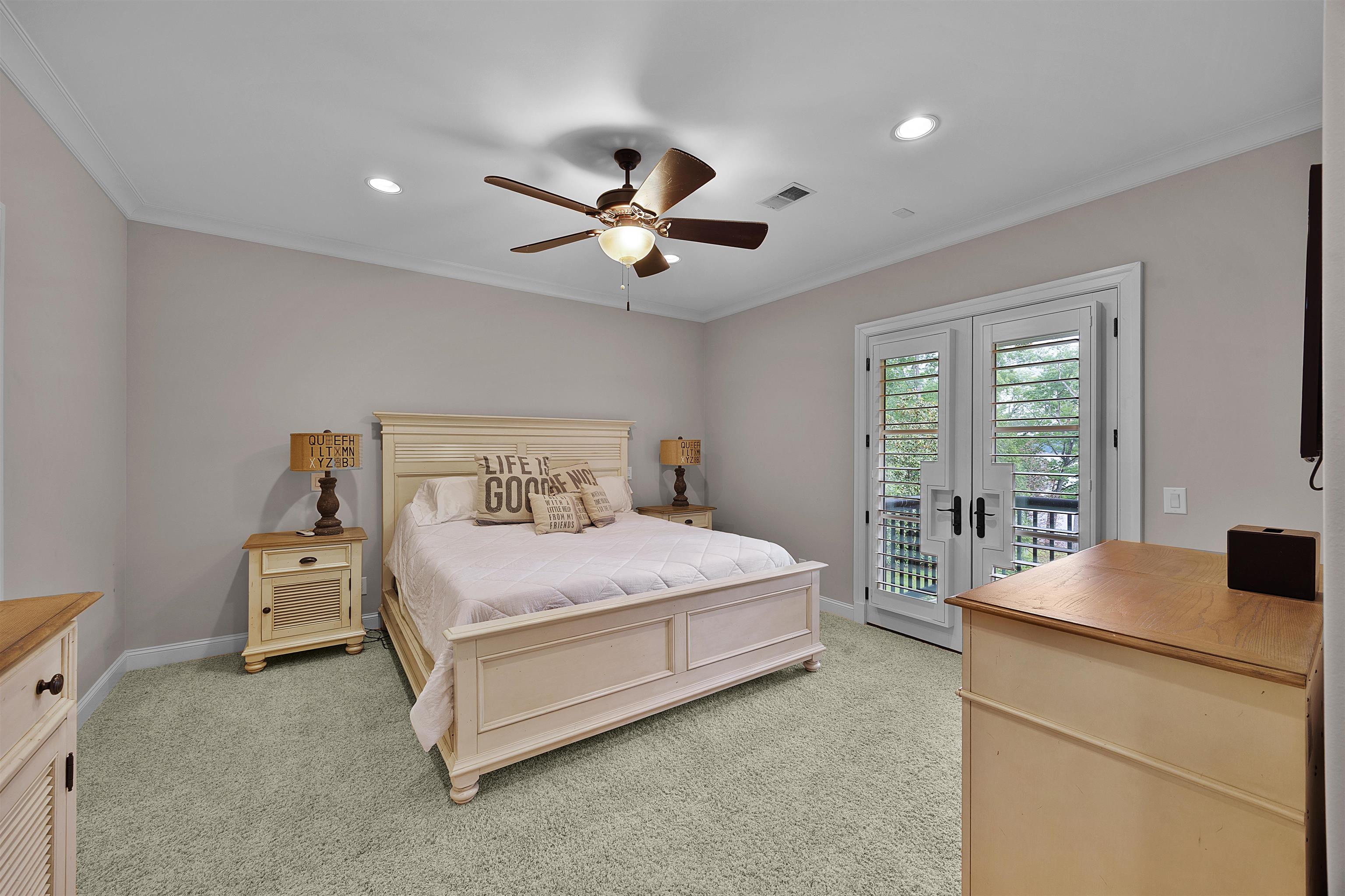 25 Caney Hollow Road Counce, TN 38326 - Photo 28 of 40 Bedroom featuring access to outside, light colored carpet, french doors, recessed lighting, and baseboards