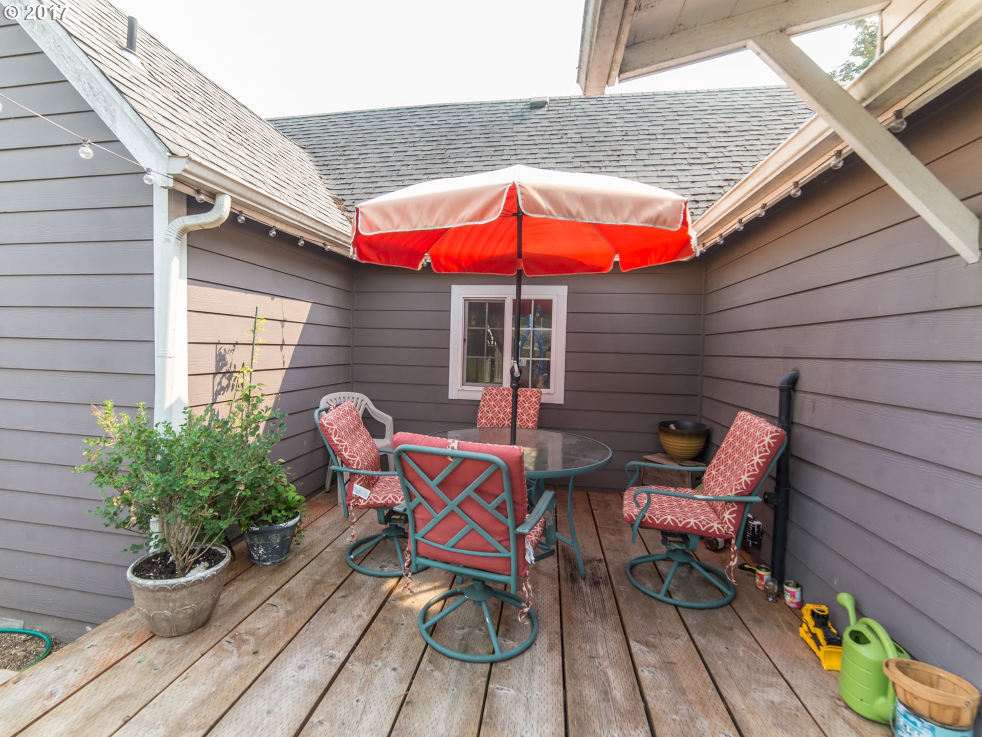 223 57th Street Springfield, OR 97478 - Photo 8 of 8 an outdoor sitting area with furniture and wooden deck