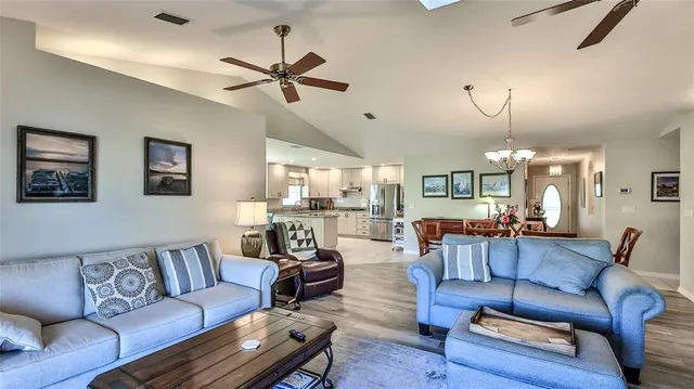a view of a house with backyard porch and garden