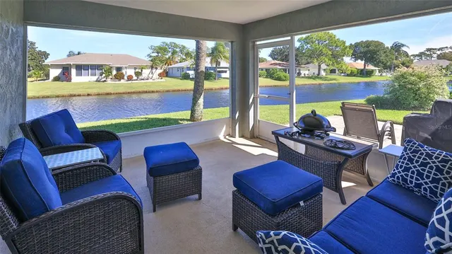 a view of a house with swimming pool yard and patio