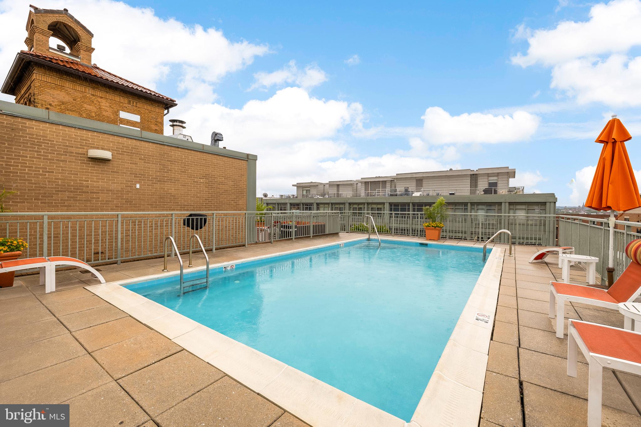 2425 L Street Northwest, Unit 234 Washington, DC 20037 - Photo 23 of 23 a view of a balcony with two chairs