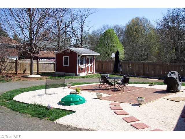 1431 Capri Road Southwest Winston-Salem, NC 27103 - Photo 8 of 9 Other. Park-like backyard with privacy fence