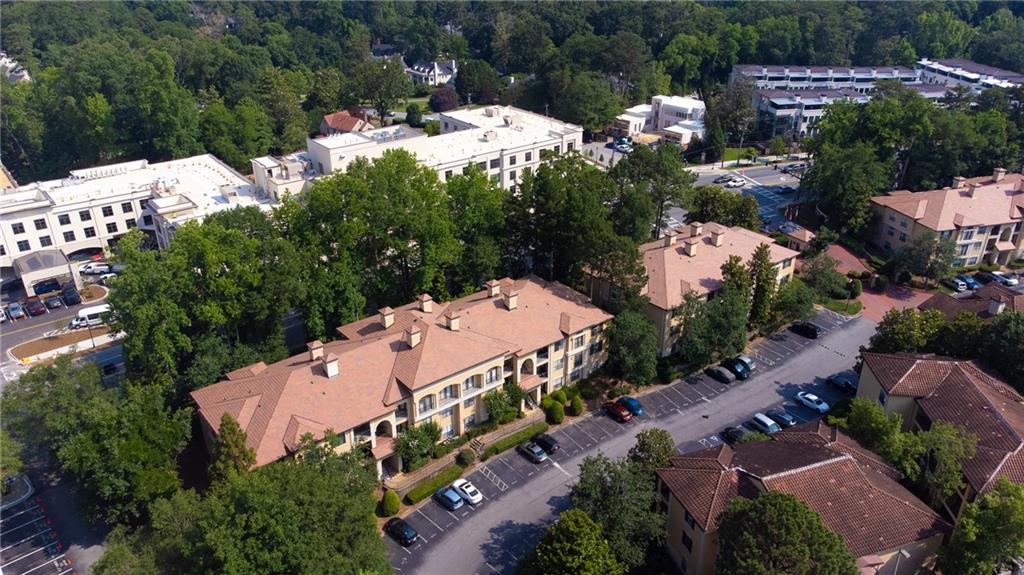3777 Peachtree Road Northeast, Unit 715 Brookhaven, GA 30319 - Photo 11 of 17 an aerial view of a house with yard swimming pool and outdoor seating