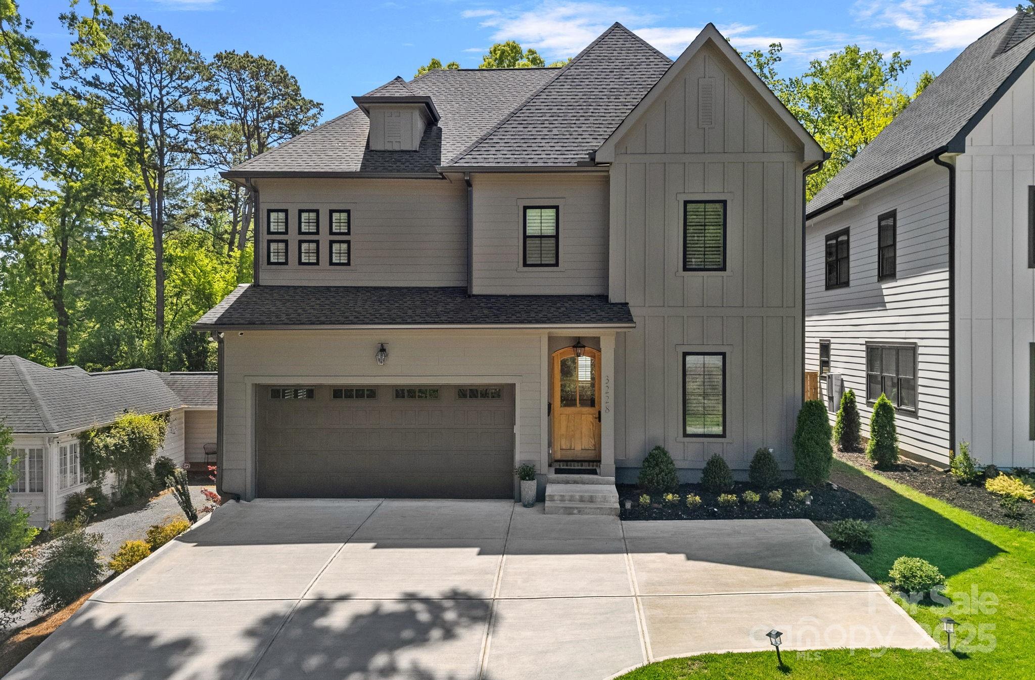 3228 East Ford Road Charlotte, NC 28205 - Photo 1 of 31 a front view of a house with yard